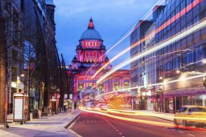 Image of a busy Belfast city centre at night